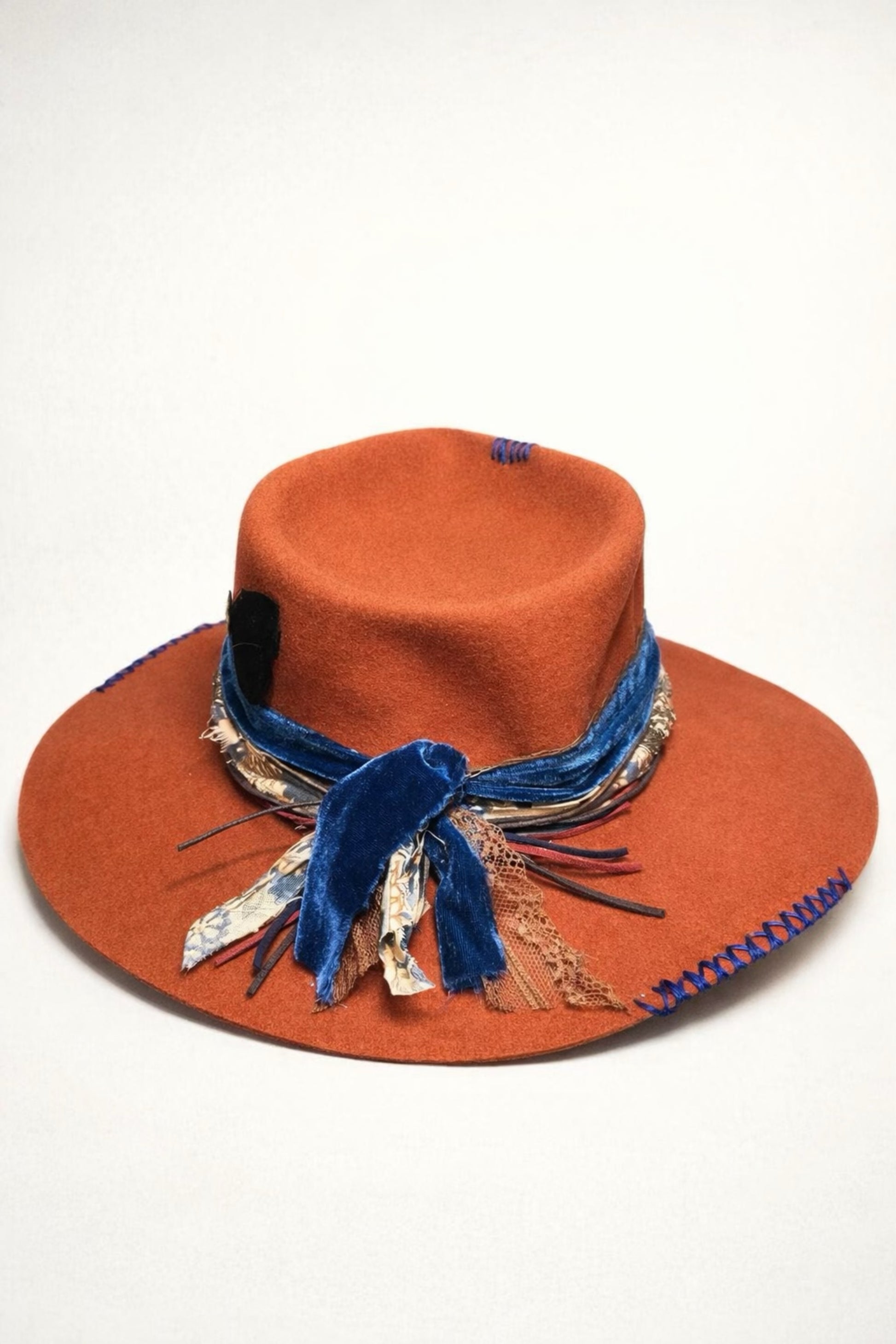 burnt orange fedora hat UK blue detail western style
	•	custom western hat UK orange fedora with stitching